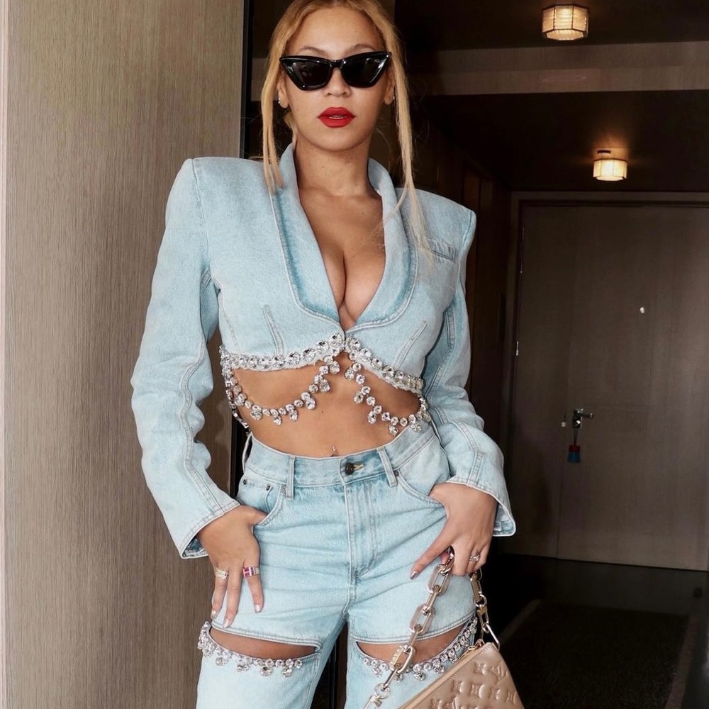 Crystal embellished cut out high waist straight leg denim.